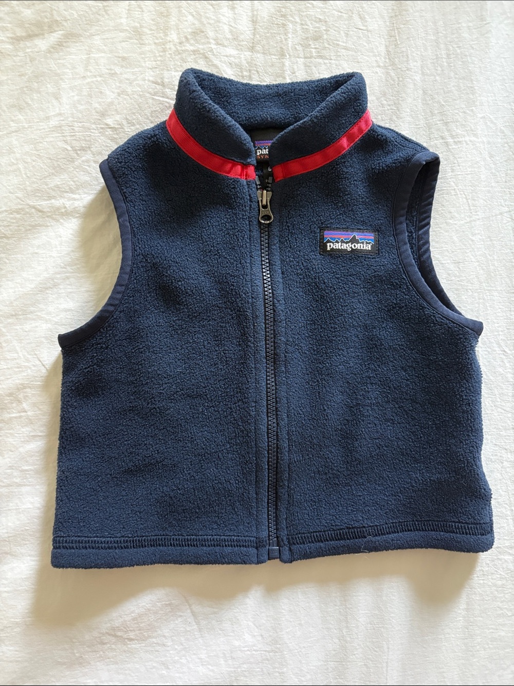 Patagonia Navy Fleece Vest with Red Trim